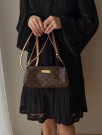 Louis Vuitton Eva (2010) – kompakt clutch i Monogram thumbnail