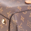 Louis Vuitton Montaigne (2010) – elegant veske i Monogram thumbnail