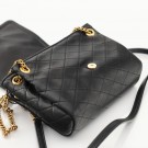 Saint Laurent Mini Nolita (2023) – elegant veske i sort lammeskinn  Klassisk Saint Laurent Mini Nolita i mykt sort lamme thumbnail